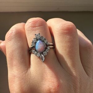 Two Opal Oct b-day bomb party rings both size 7! Pretty just not my style.